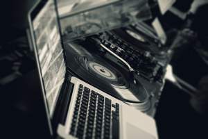 DJ Laptop besides deck