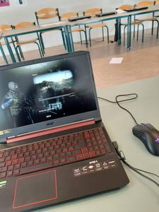 guy with a laptop playing Tarkov