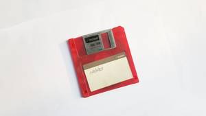 A red floppy disk